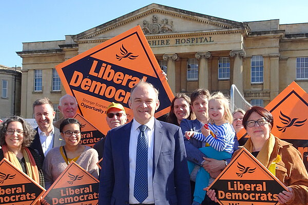 Party leader Sir Ed Davey MP with Reading Lib Dem candidates outside the Royal Berkshire Hospital