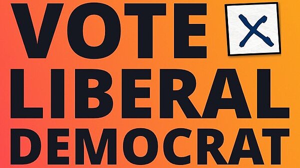 Graphic saying "Vote Liberal Democrat for a fair deal".