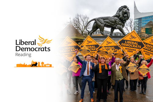 The Reading Liberal Democrats cheering in front of the Maiwand Lion